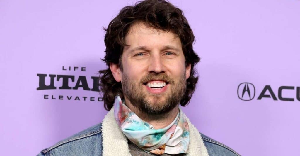 Jon Heder  with a beard and a headscarf, capturing the essence of Jon Heder's unique look.