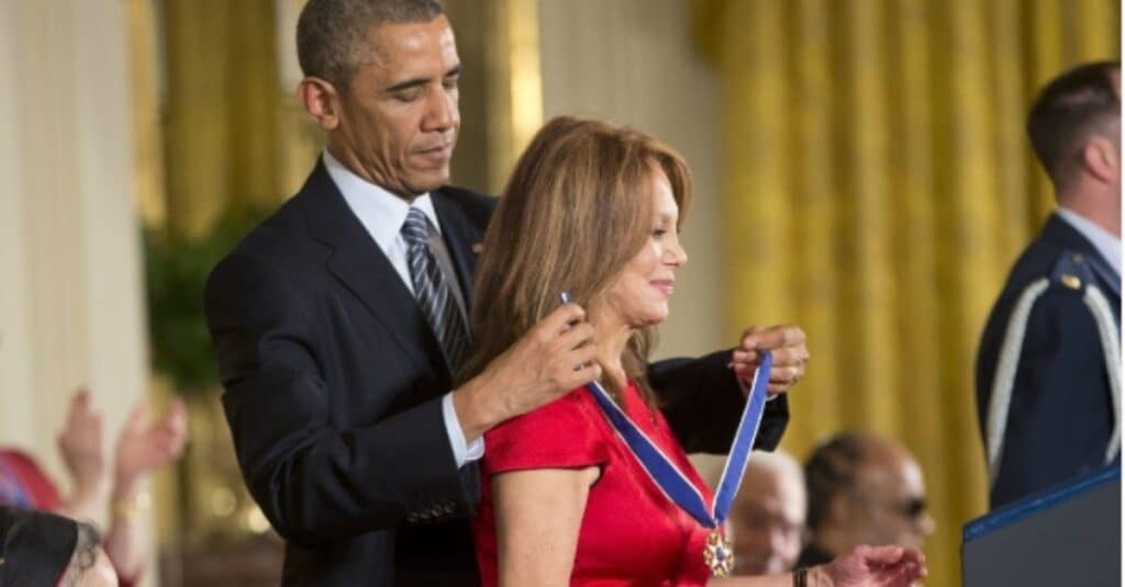 President Obama awards the Medal of Freedom to Michelle Obama, celebrating her impactful role as First Lady and advocate.